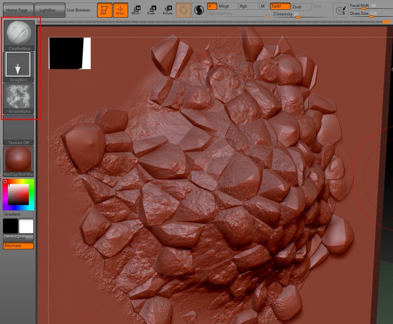 Select the brush attributes you wish, then click and drag around the mesh to sculpt the details.